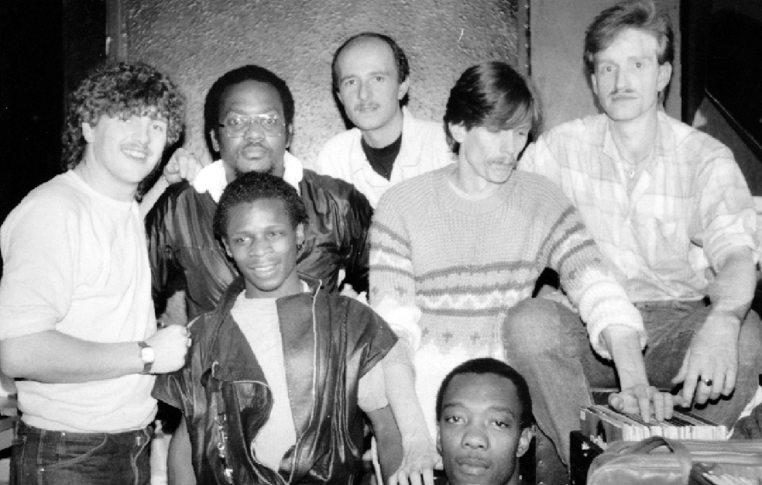 The crew at Tiffany’s Manchester, 1983. Left to right: (back row) Greg Wilson, Mike Shaft, Richard Searling, Colin-Curtis, and Jonathan Woodliffe; (front row) Cleveland Anderson and Hewan Clarke.